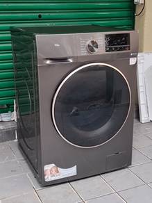TCL 2IN1 front load hot washer with dryer 10/6 k.g
