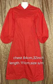 it is a red puffy- sleeves dress with a casual