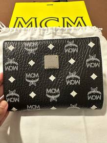 MCM original never worn preloved.