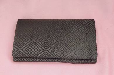 Embroidered dinner clutch