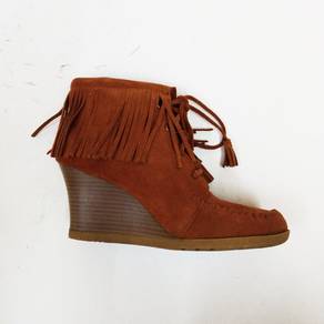 Minnetonka Suede Fringe Lace Up Wedge Ankle Bootie