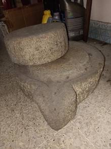 60 years Traditional stone gain grinder.