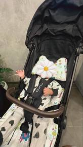 NUNA TRVL auto fold compact stroller