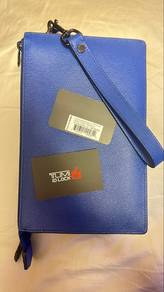 TUMI Blue Leather Clutch