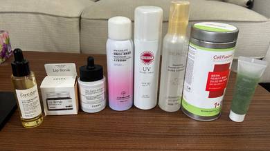 Skincare products and scented candle