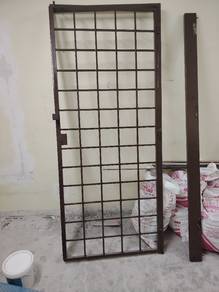 pintu grill  besi rumah