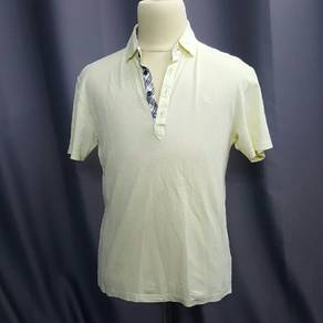 Burberry yellow polo t-shirt.