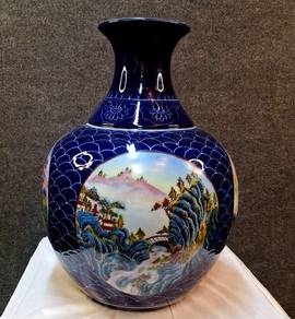 Chinese Porcelain Famille rose vase with oriental