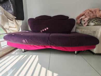 Purple Sofa with Pink Underside