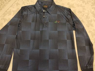Original Greg Norman Golf polo jersey
pit 22
