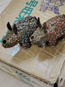 old brass rhinoceros