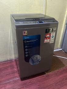 Mesin Basuh Midea 7.5kg Top load