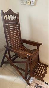 Vintage wooden reclining chair with footrest