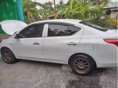 Nissan Almera E in Jawi, PNG