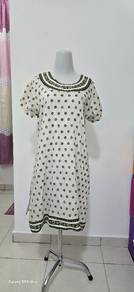 Nice Kurti with green emerald pants.