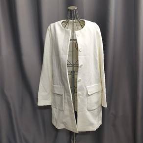 Uniqlo womens collarless mid length cream coat