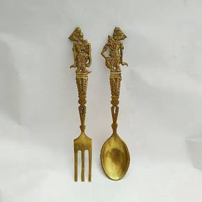 Antique copper spoons and forks