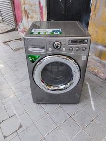 LG 2in1 front load hot washer with dryer 13/7-kgs
