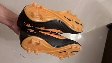 boots hypervenom black orange