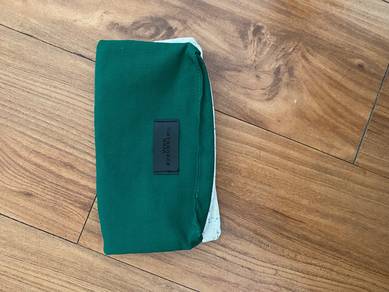 Green canvas pouch with zipper