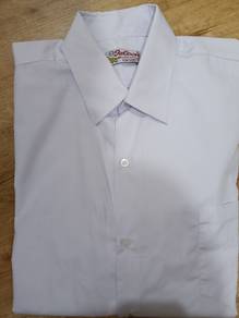 White shirt green shorts