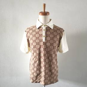 Gucci GG supreme monogrammed panelled polo shirt