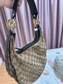 Gucci GG canvas hobo-style shoulder bag