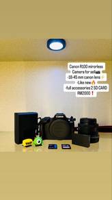 canon eos R100+18-45mm canon lens with 2sd card