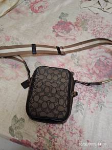 sling bag coach original mat
