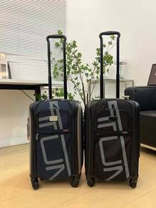 TUMI International Dual Access 4 Wheeled Carry-On