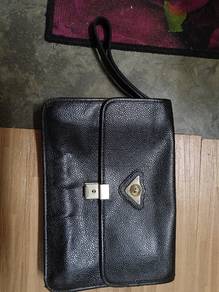 renoma leather clutch bag 