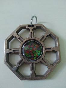 Polygon keychain with ammolite and tritium tubes