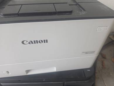 3 used Canon printers. 2 laser 1 inj