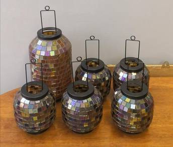 Broken glass candle holder lilin