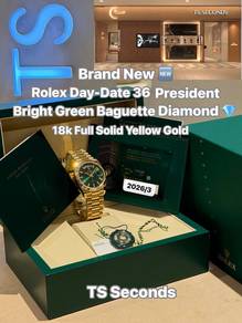 Rolex Day-Date 36mm Green Baguette Diamond 128238