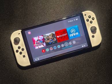 Nintendo Switch OLED with 5 games