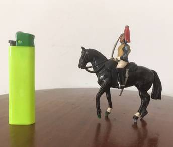 Vintage cast iron horse soldier