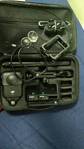 DJI osmo360, with 3 battery top plates.