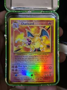 original charizar with ori box tin