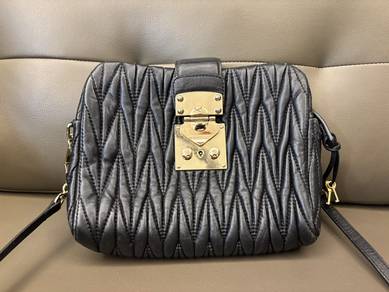 1Miu Miu Black Sling Bag