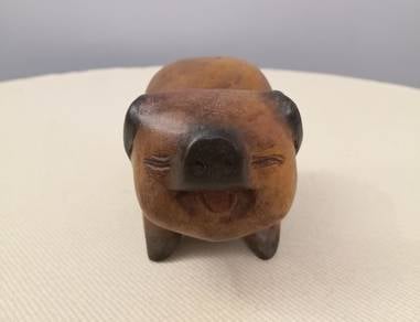Wooden pig figurine