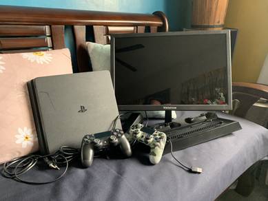PS4 Slim 1TB with accessories