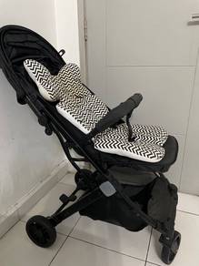 Stroller with cushion