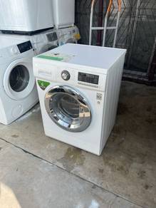 LG 2in1 front load hot washer with dryer 7/4-k
