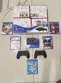 PS4 Slim 500GB + 2 CONTROLLER + 5 GAMES