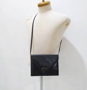 Jo of Florence Italy Genuine Leather Sling Clutch