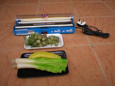 Wrapping & Sealing Machine - Packing Black Tray
