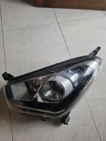 Used ori Myvi Icon front headlamp (left)