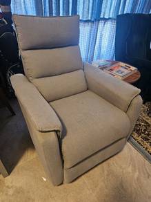 Used single sitter sofa with leg rest