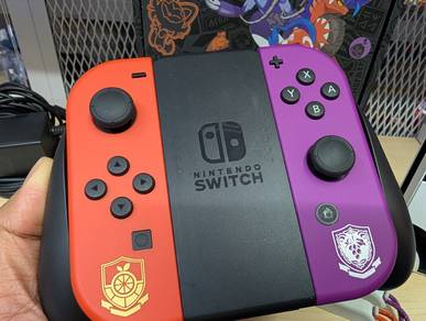 Like New Nintendo Switch OLED Pokemon Complete